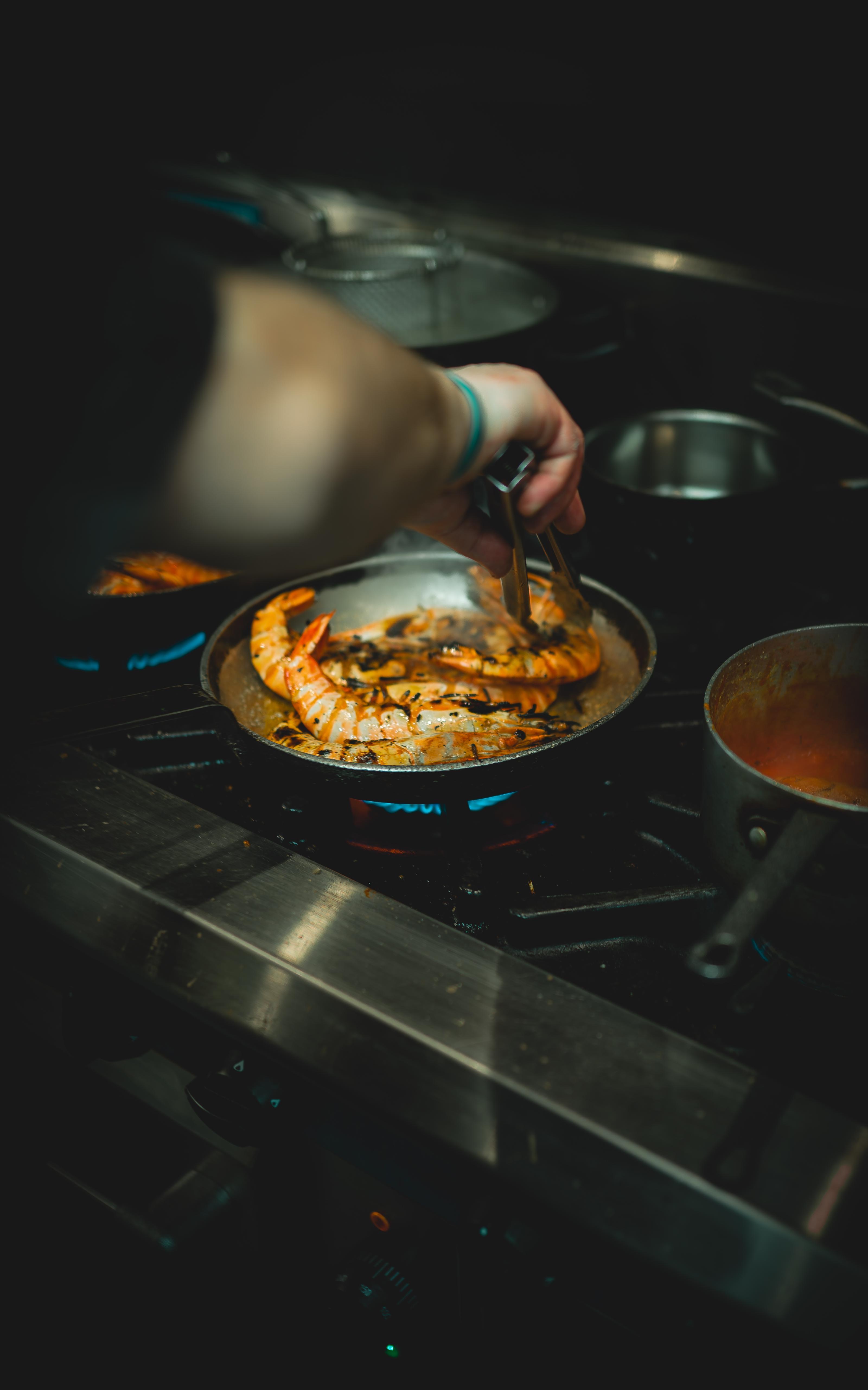 Chef cooking at Max's Brasserie, Southampton